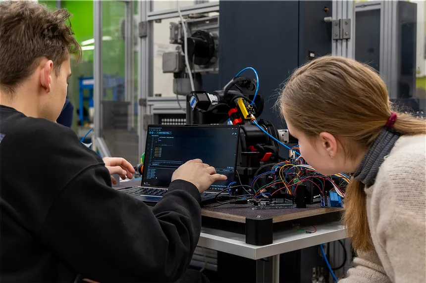 Students working on a robot.